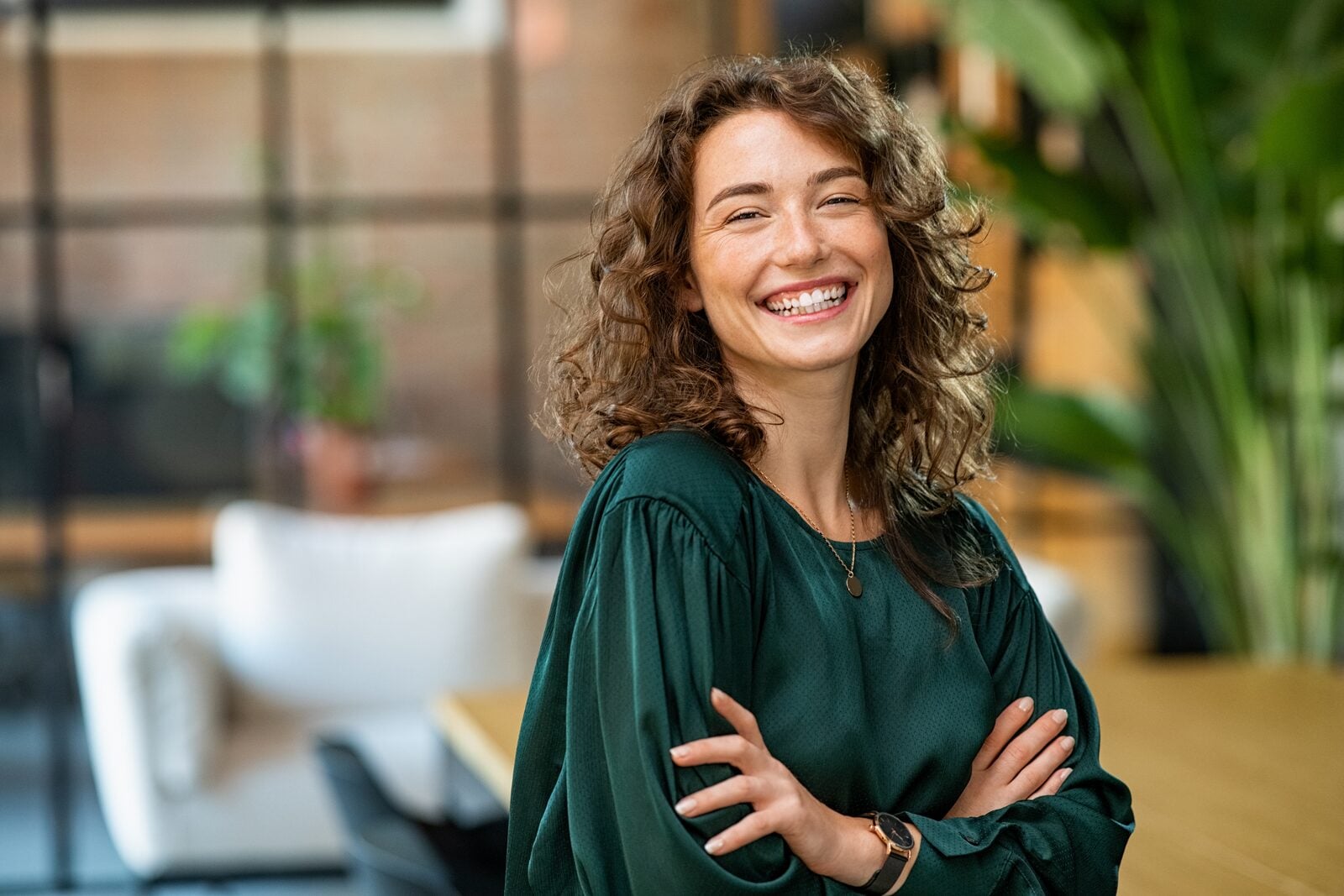 A woman smiling confidently